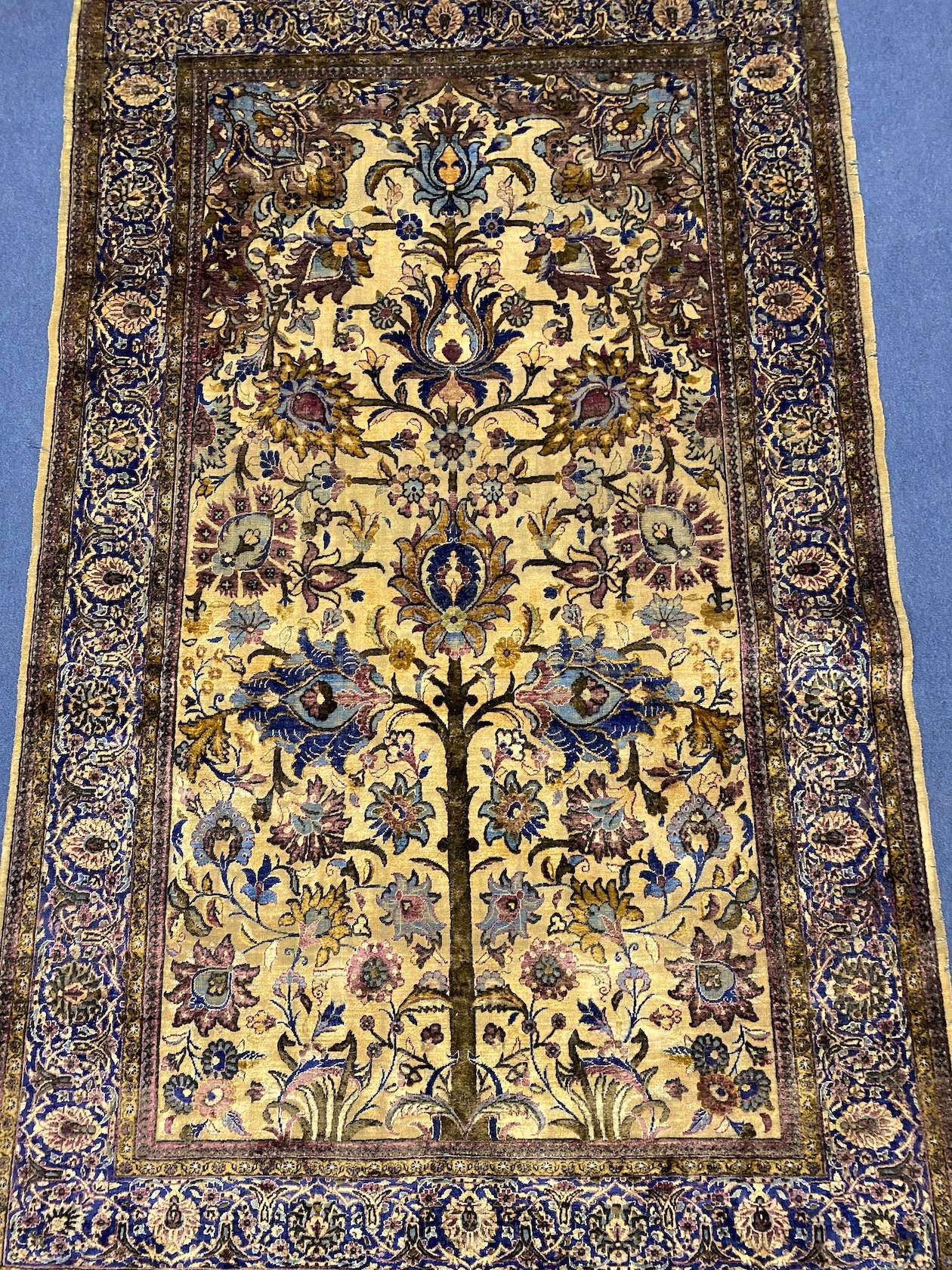 A Persian tree of life silk rug, 206 x 128cm